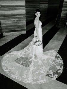 Yasmin displaying her full wedding dress at Hudson House in Jersey City