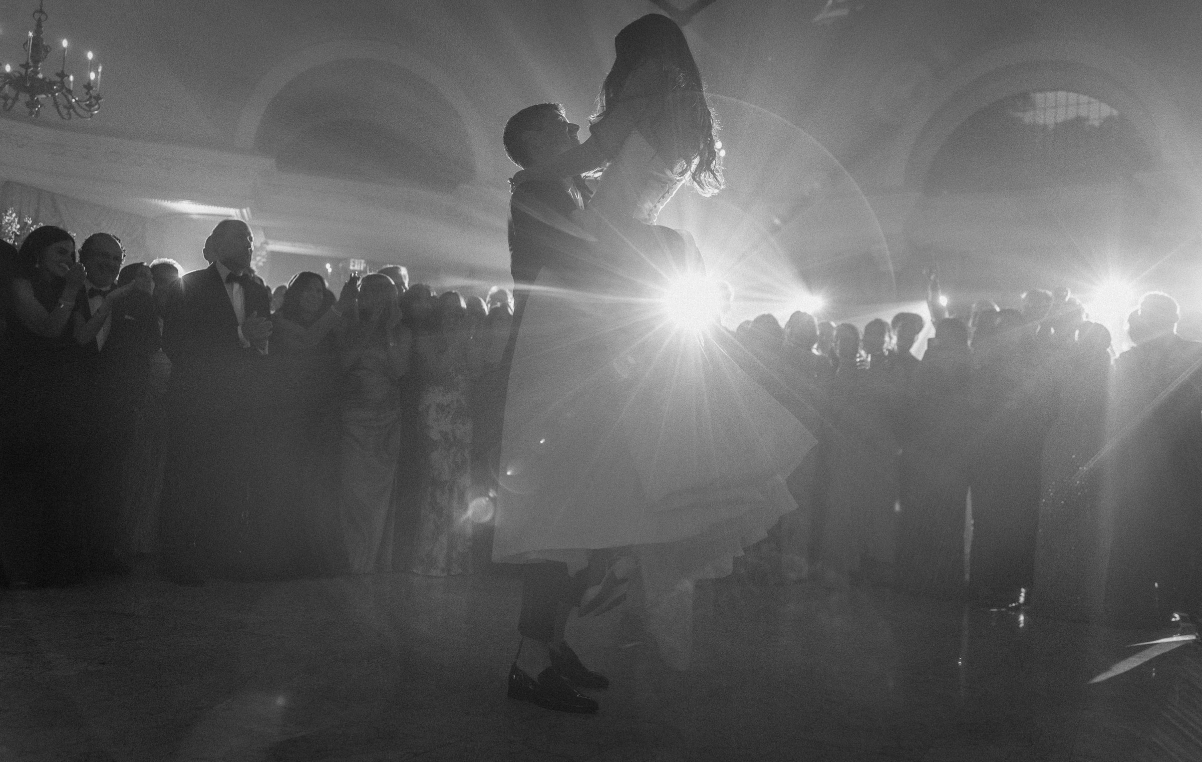 Black-and-white silhouette of Casey and Jacob during their first dance