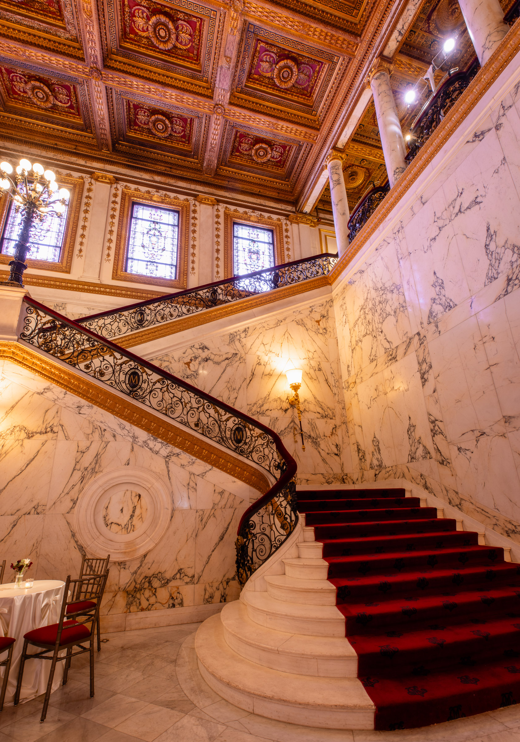Marble staircase and iron railing inside the Metropolitan Club