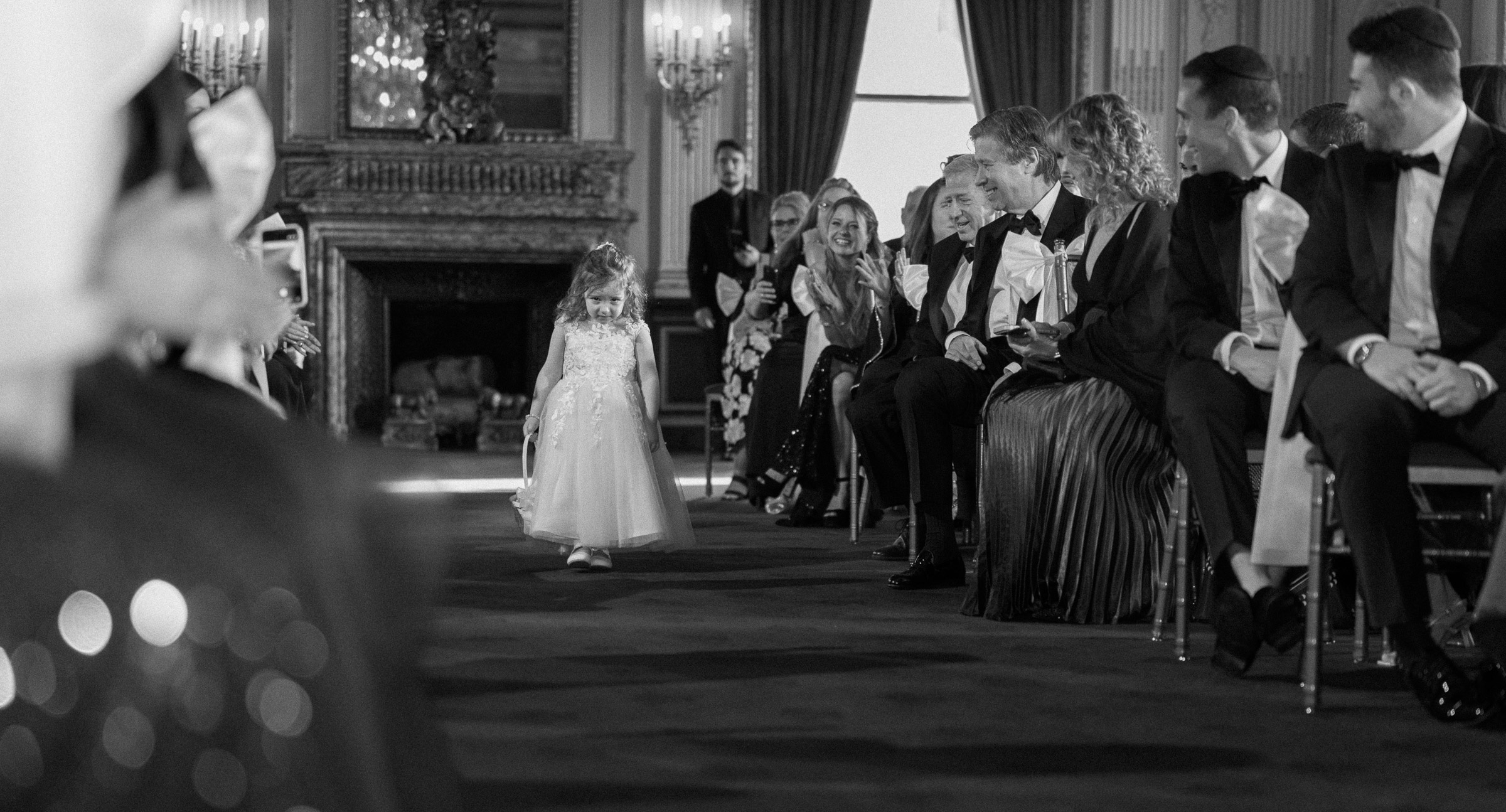 Colette walking down the ceremony aisle with her father