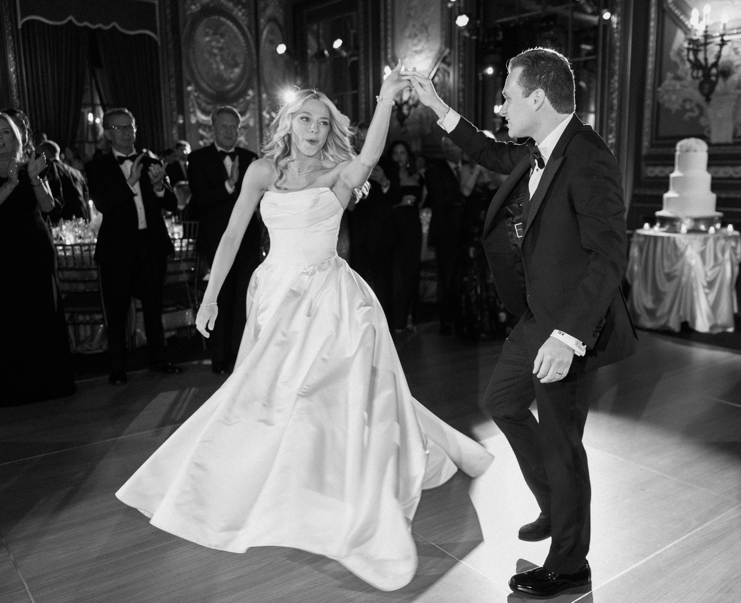 Black-and-white photograph of Colette and Cameron beginning their first dance