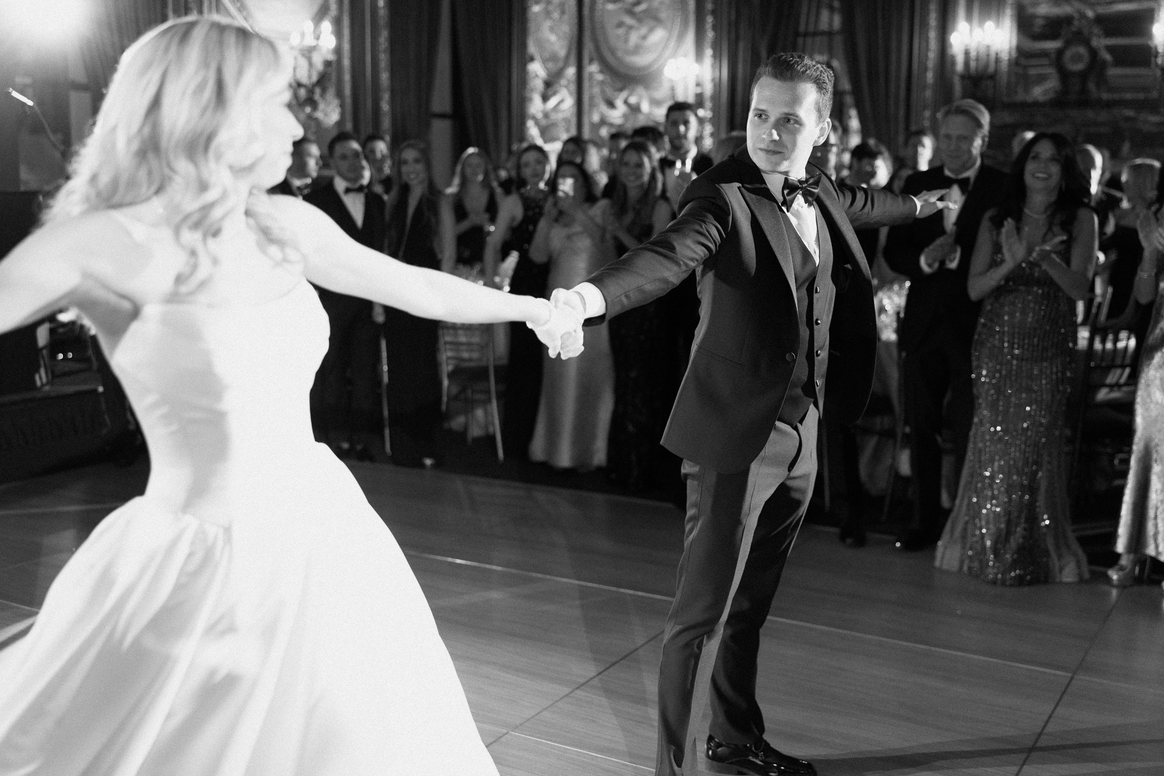 Colette and Cameron smiling during their first dance