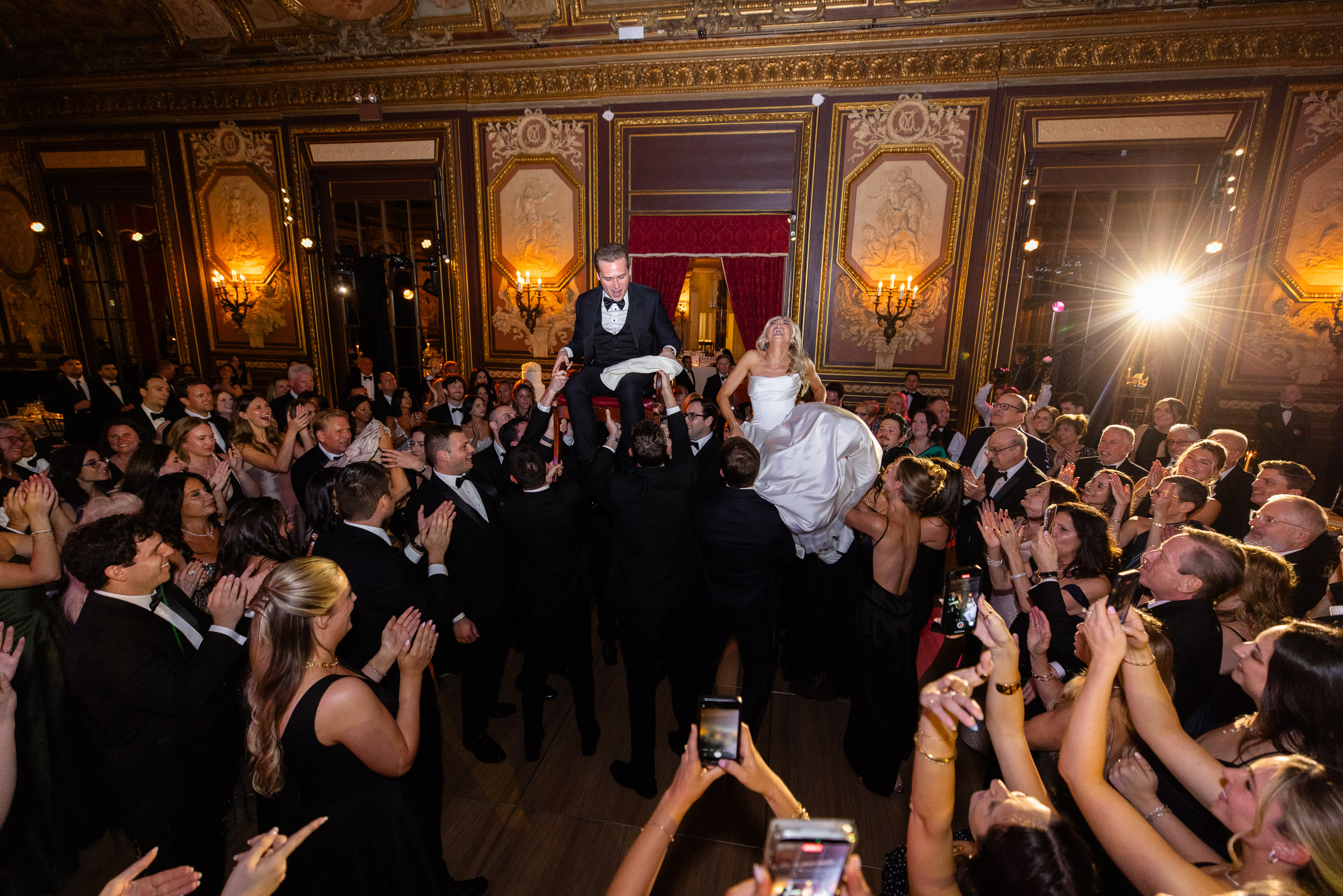 Guests surrounding Colette and Cameron during the hora