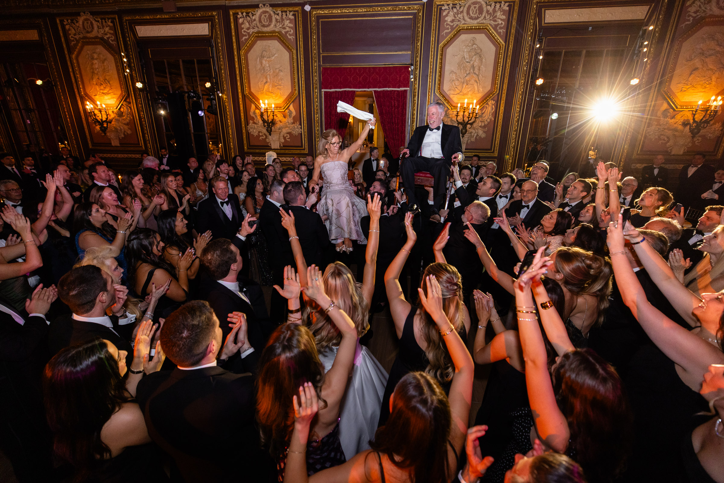 Wide view of the crowded dance floor during the hora