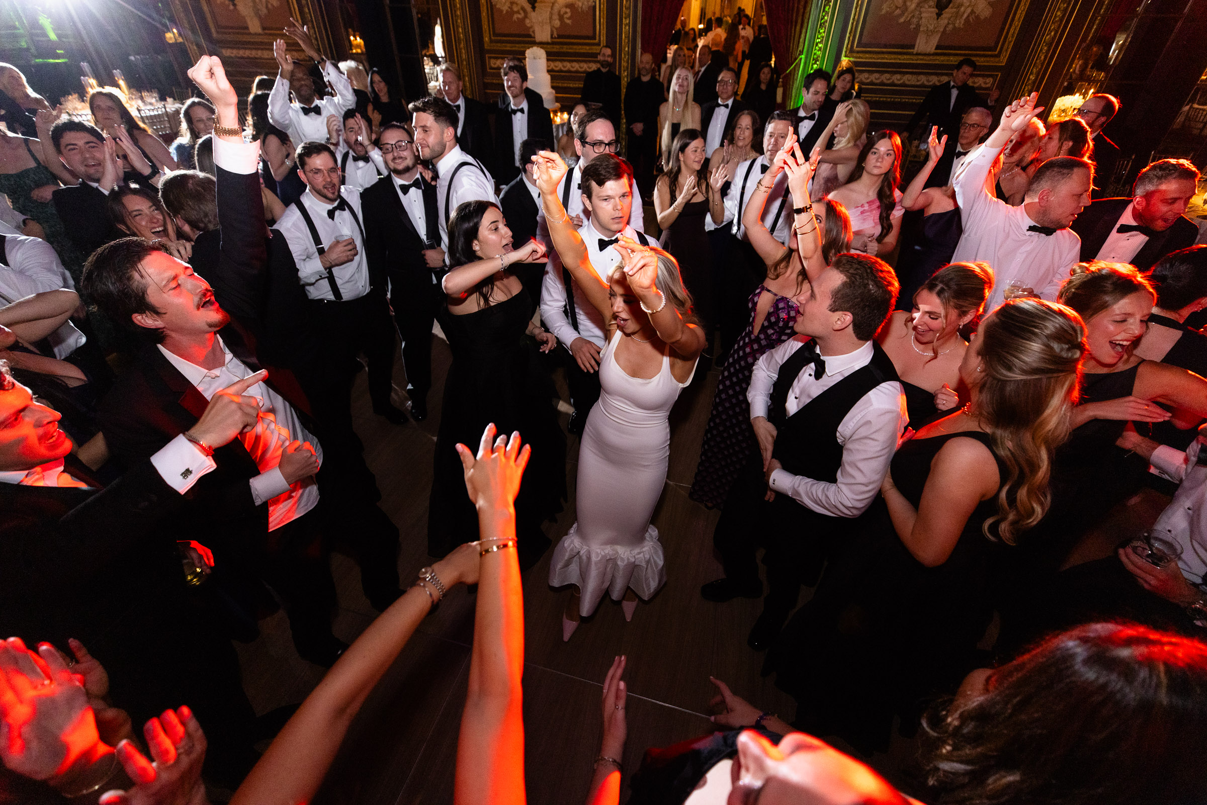 Overhead view of Colette and Cameron surrounded by guests on the dance floor