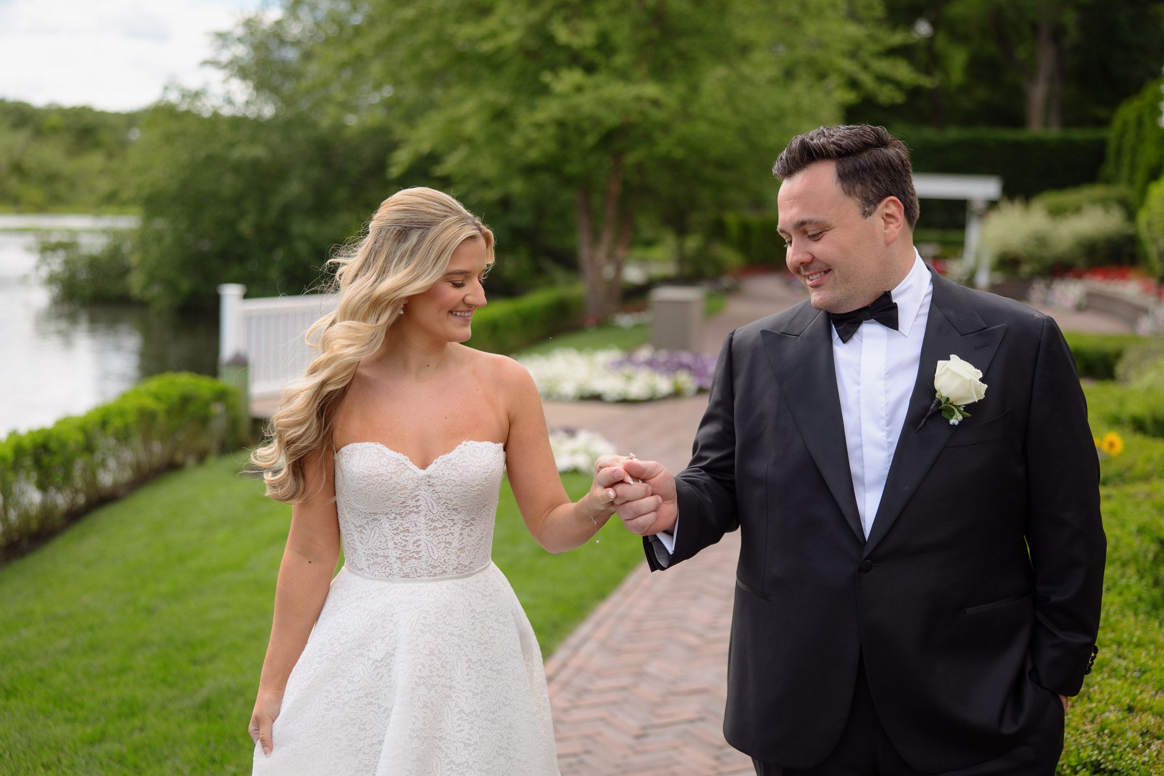 Liz and Austin laughing together during their garden portraits