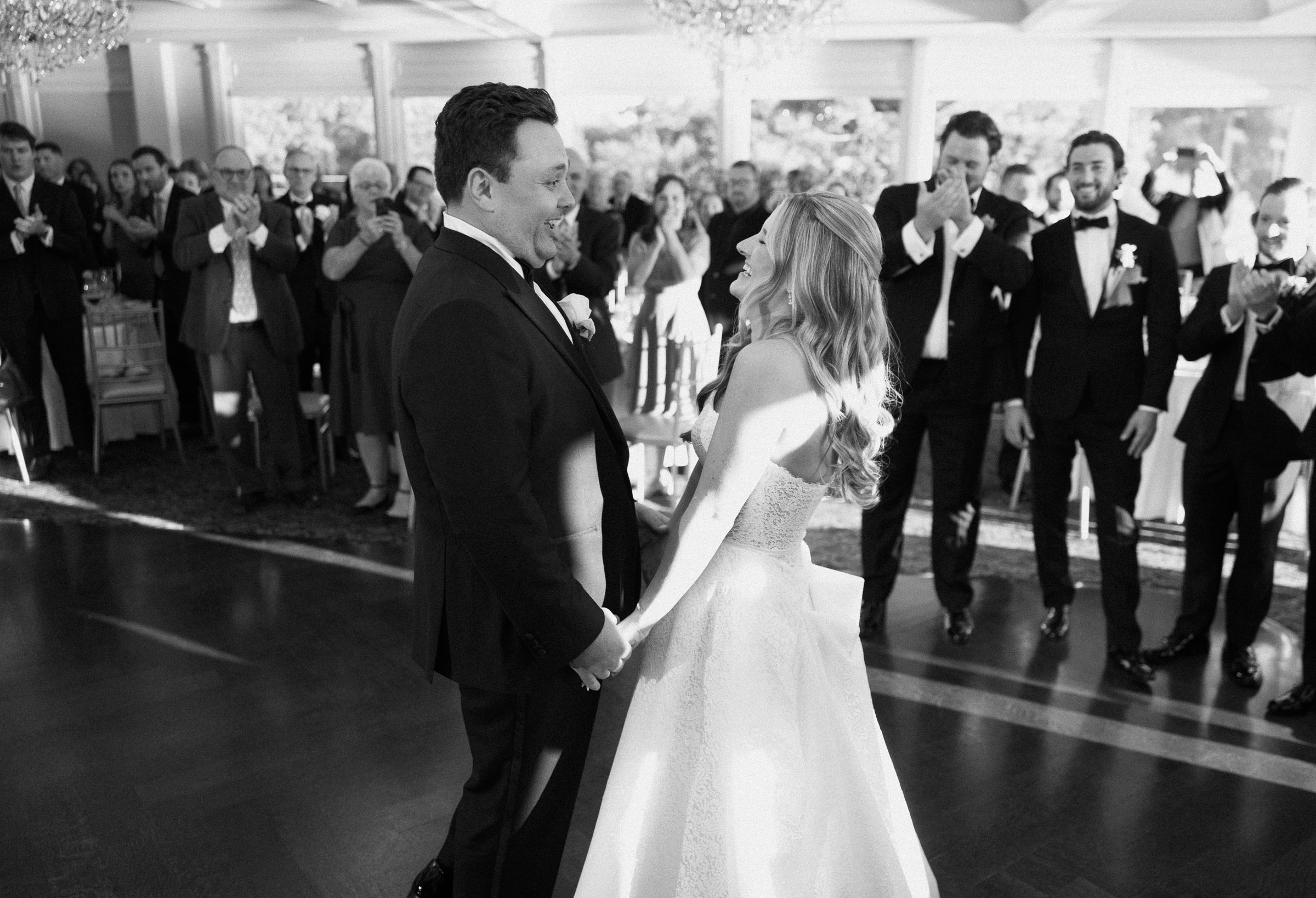 Black-and-white photograph of Liz and Austin beginning their first dance