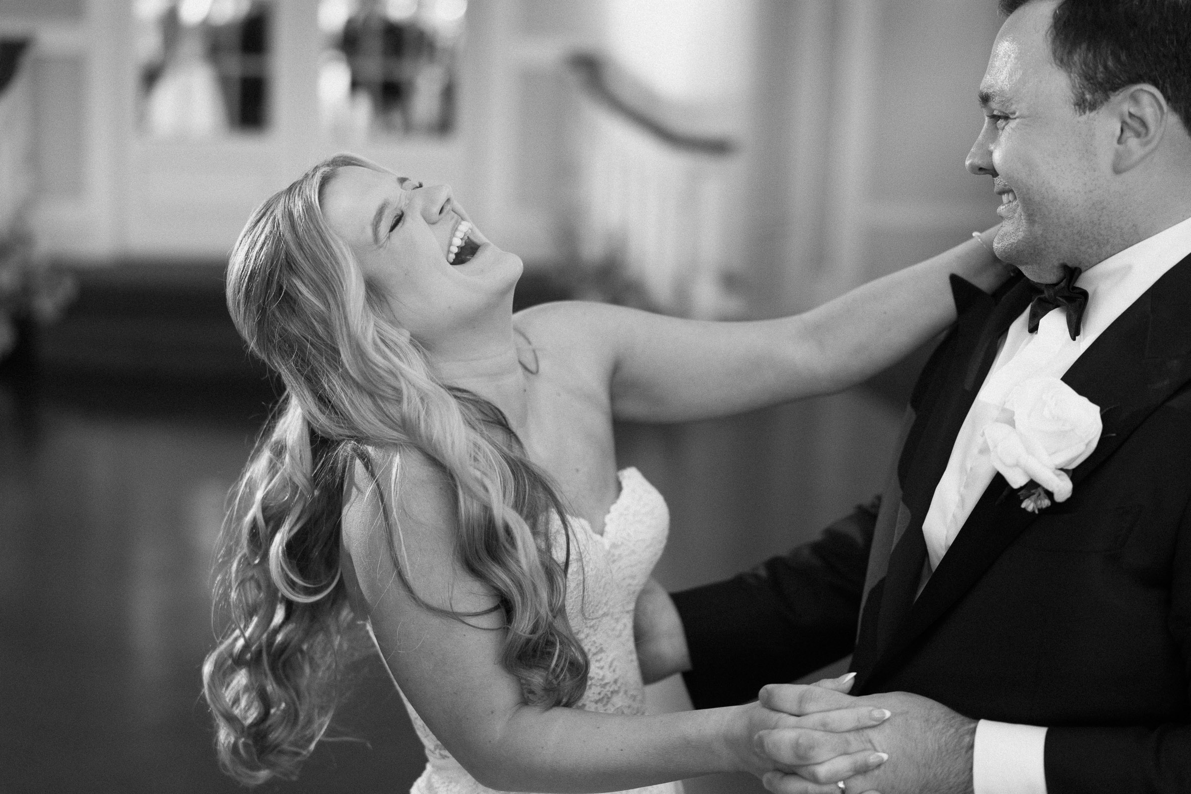 Liz laughing with Austin during their first dance