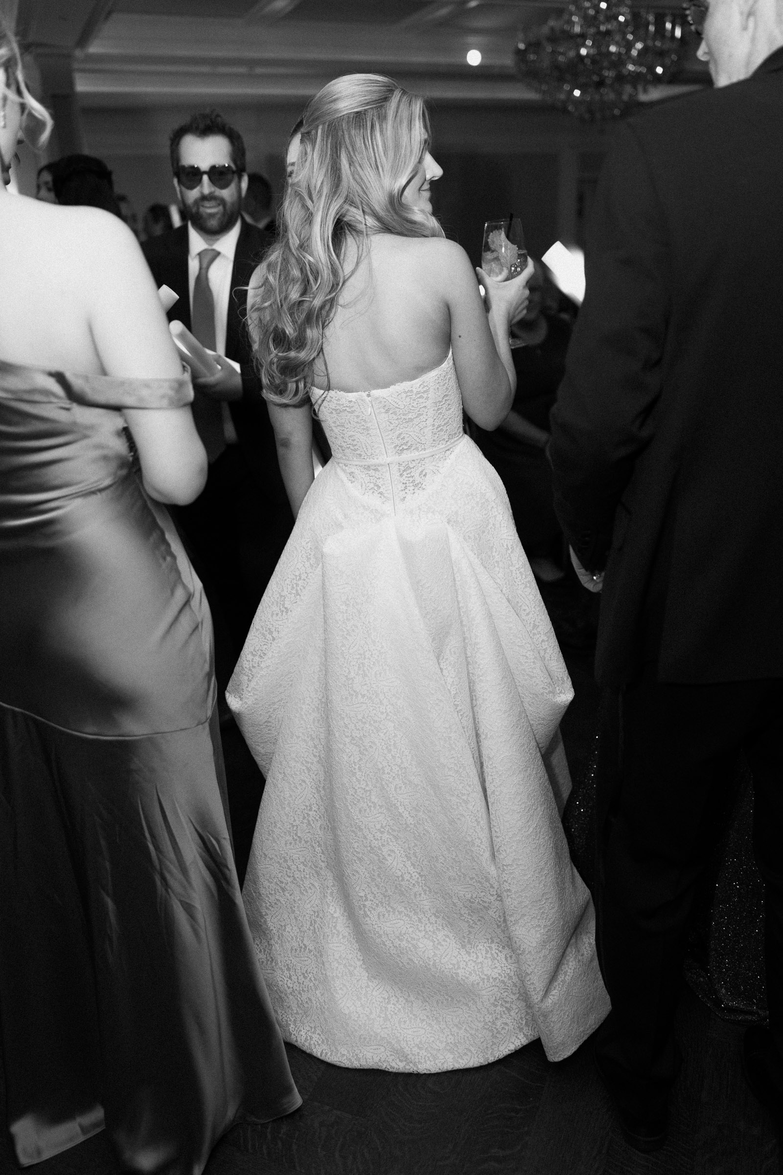 Black-and-white photograph of Liz and Austin dancing together