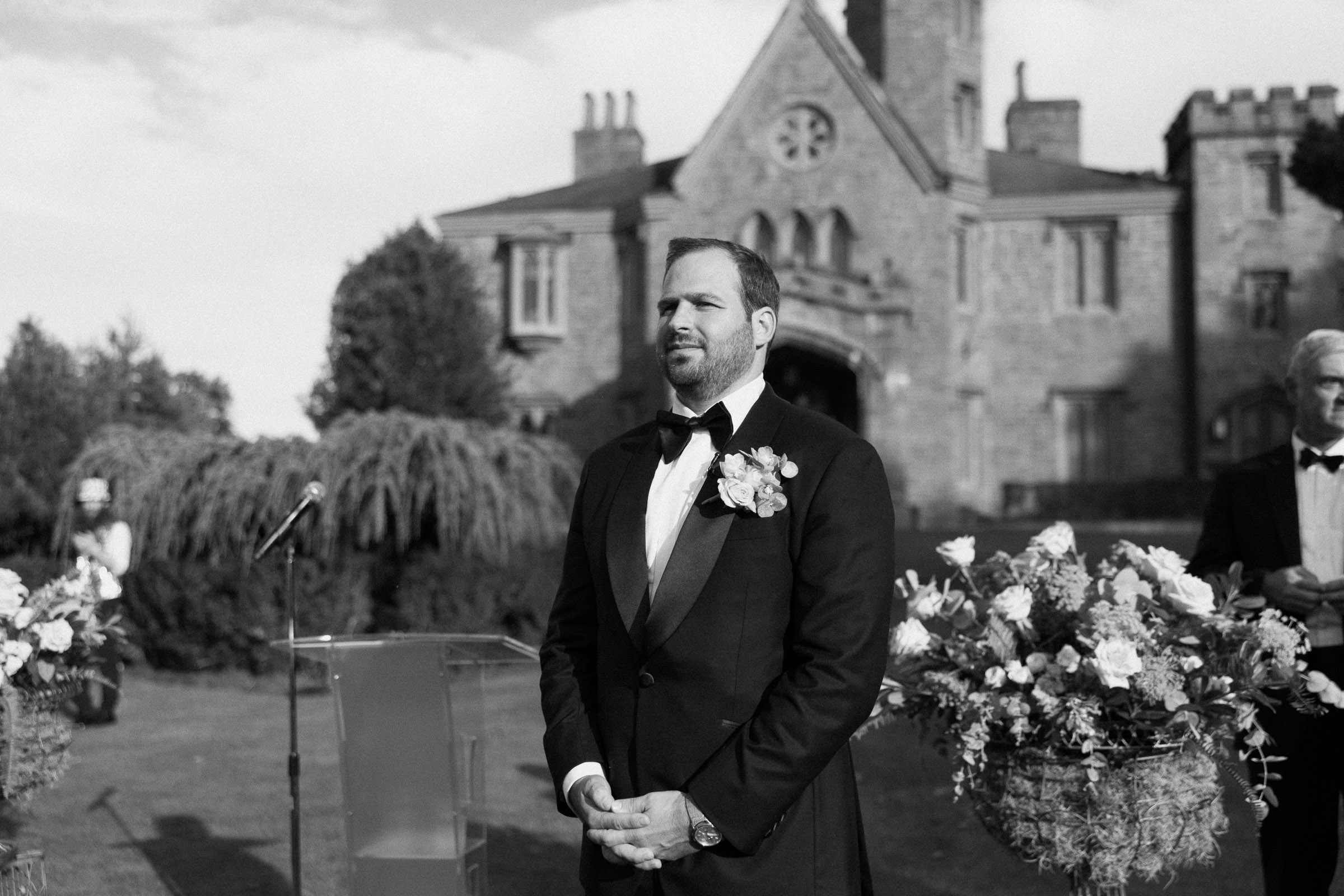 Ryan watching Alexandra approach during their Whitby Castle ceremony