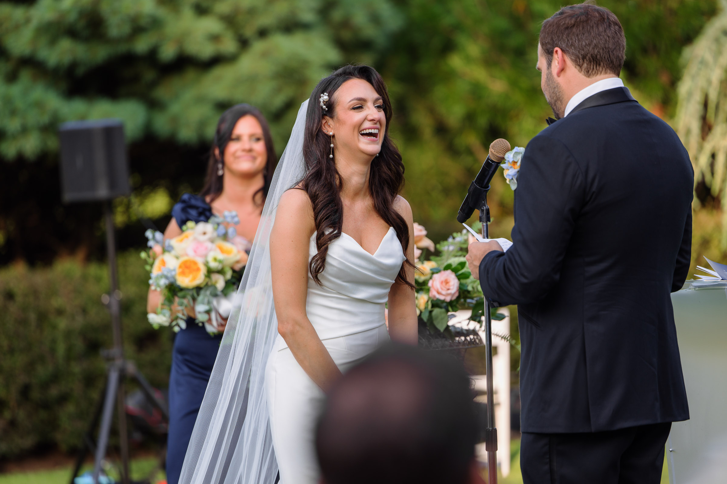 Alexandra laughing with Ryan during their ceremony