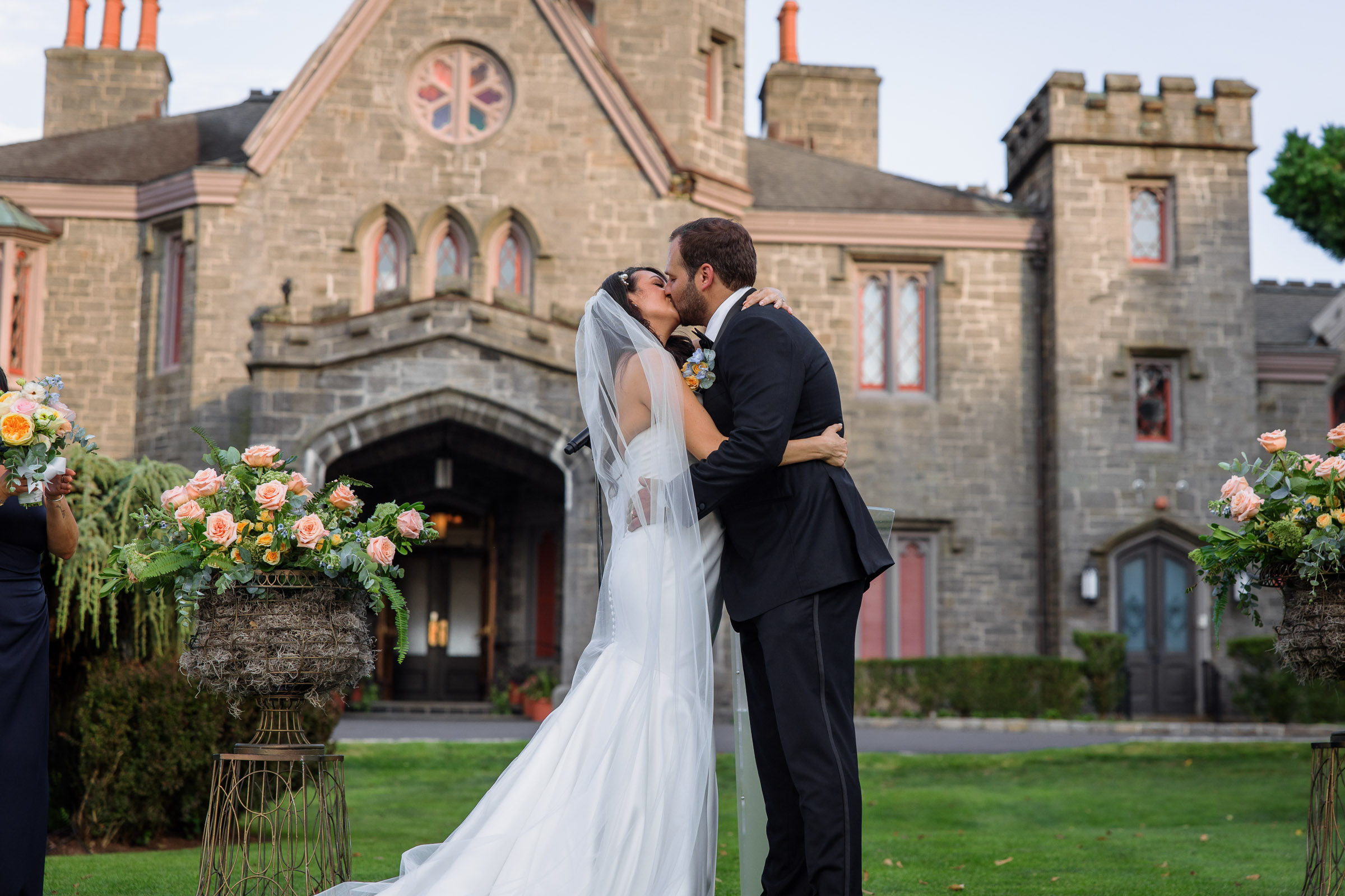 Alexandra and Ryan’s first kiss with Whitby Castle behind them