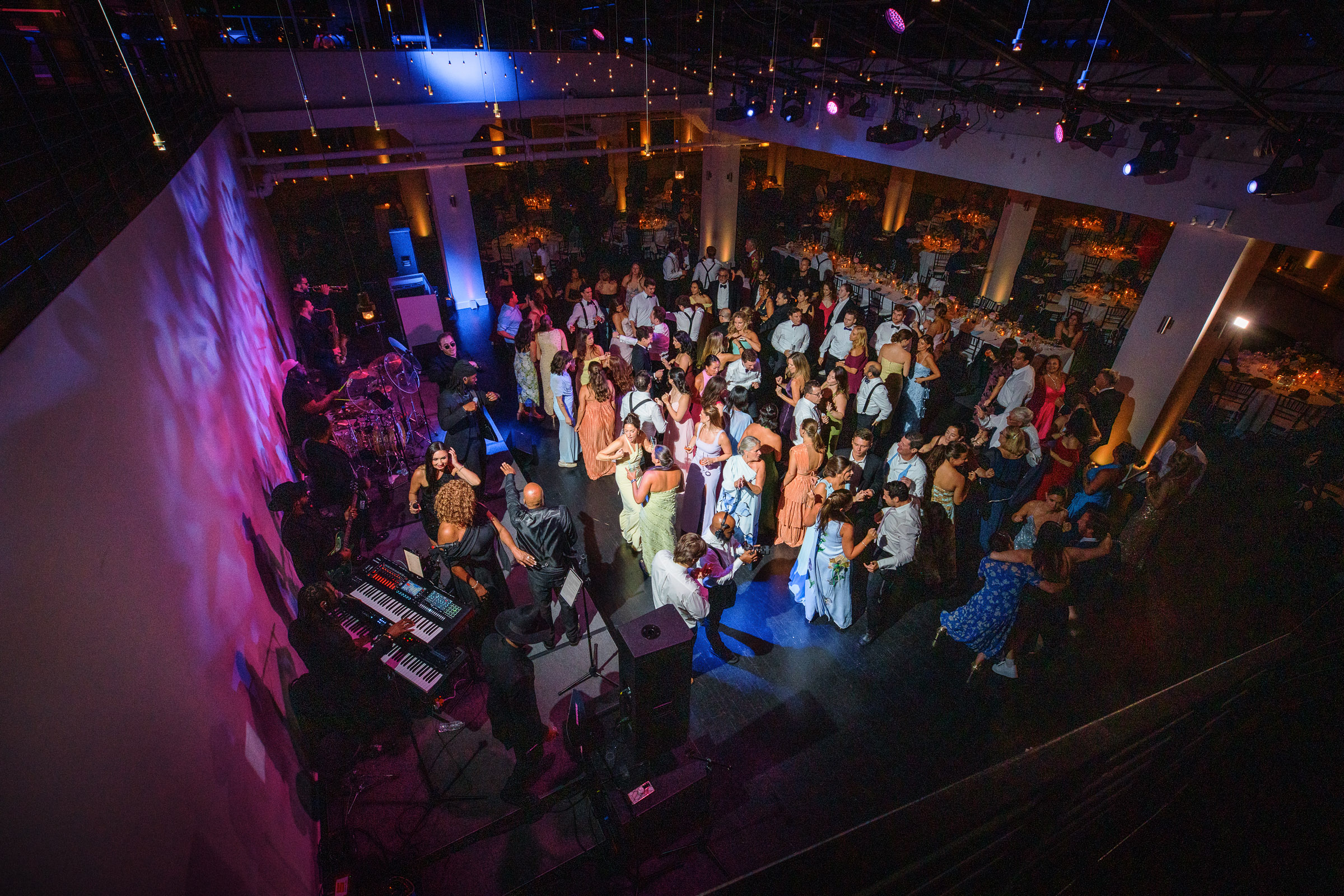 Overhead view of the packed Tribeca Rooftop dance floor late in the reception